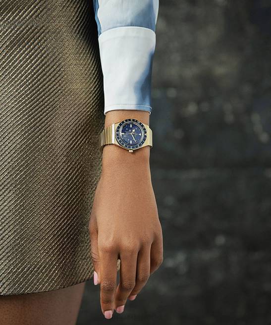 relojes | Q Timex reloj celestial de 36 mm con correa de expansión de acero inoxidable tono dorado/azul mujer Z8X2328