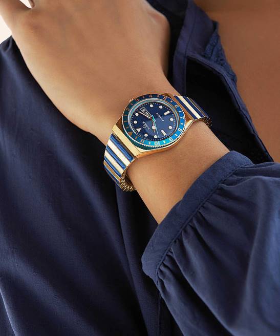 relojes | Q Timex reloj malibu de 36 mm con correa de expansión de acero inoxidable tono dorado/azul mujer Z8X2335